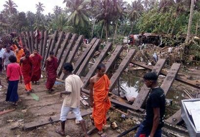 Photo: Buddhist Monks Searching for Survivors